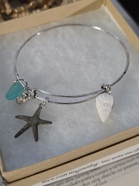 Silver Toned Starfish & Shell Charm Bangle with Aqua Glass